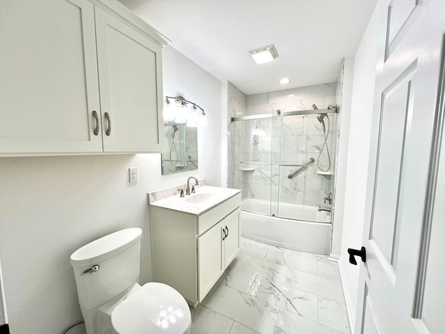 full bathroom with vanity, shower / bath combination with glass door, and toilet