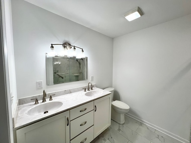 bathroom with vanity, a shower with shower door, and toilet