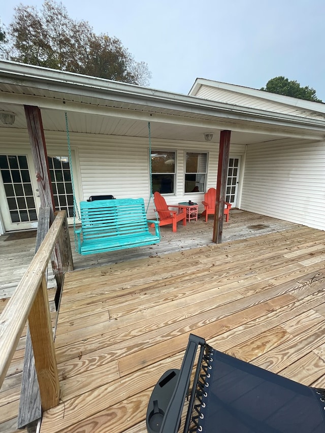 deck featuring covered porch