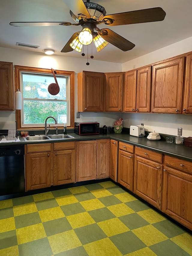 kitchen with ceiling fan, sink, and black appliances