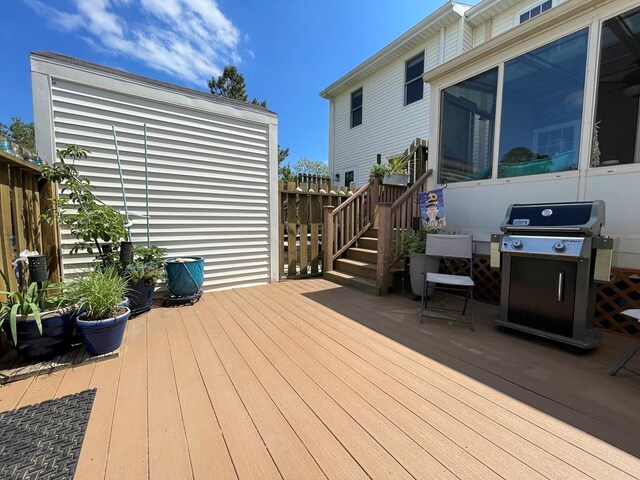 wooden deck with area for grilling