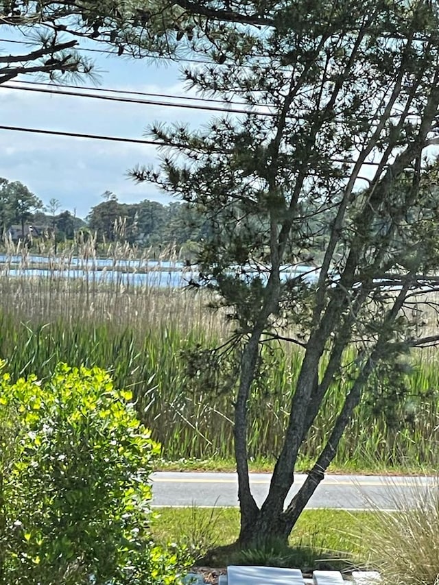 exterior space with a water view