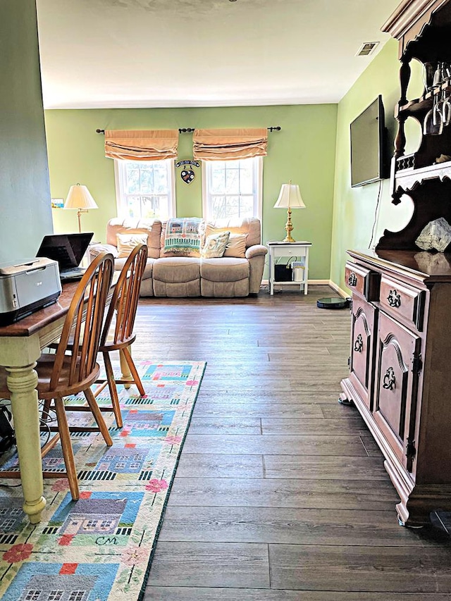 living room with dark wood-type flooring