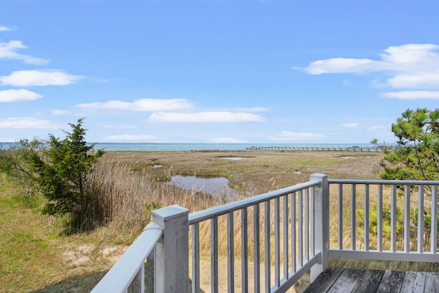 5095 Blake Point Rd, Chincoteague, VA 23336 - wooden terrace with a water view