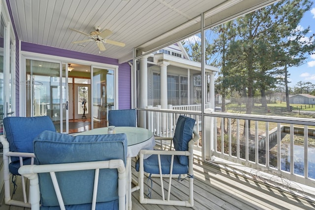 5095 Blake Point Rd, Chincoteague, VA 23336 - sunroom / solarium featuring ceiling fan, outdoor dining space, and plenty of natural light