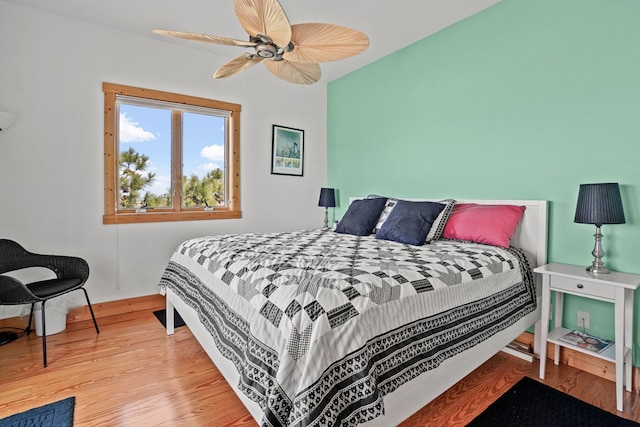 5095 Blake Point Rd, Chincoteague, VA 23336 - bedroom with wood finished floors and a ceiling fan