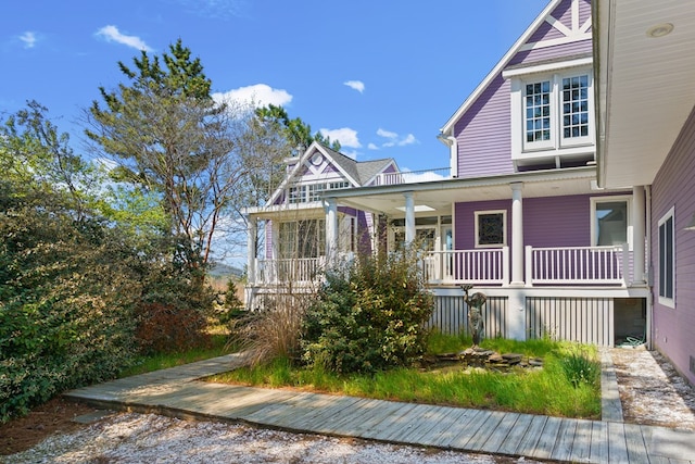 5095 Blake Point Rd, Chincoteague, VA 23336 - view of front facade with a porch