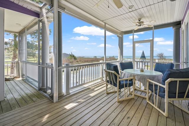 5095 Blake Point Rd, Chincoteague, VA 23336 - sunroom / solarium featuring a ceiling fan, a water view, and healthy amount of natural light
