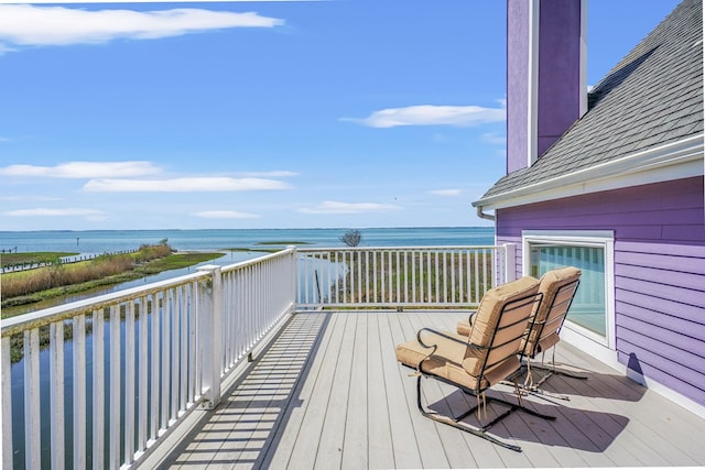 5095 Blake Point Rd, Chincoteague, VA 23336 - wooden terrace with a water view