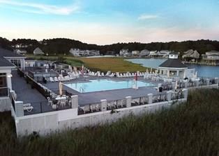 view of pool with a water view