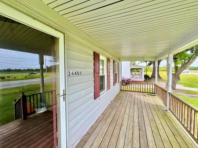 deck featuring covered porch