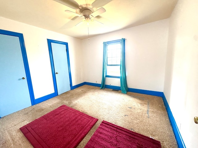 6136 Maddox Blvd, Chincoteague, VA 23336 - carpeted empty room featuring visible vents, baseboards, and ceiling fan