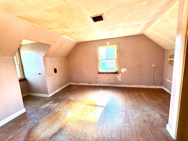 6136 Maddox Blvd, Chincoteague, VA 23336 - additional living space featuring hardwood / wood-style floors, vaulted ceiling, and baseboards