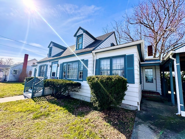 view of front of home with a front yard