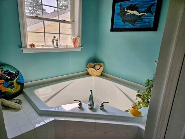 bathroom featuring a relaxing tiled tub