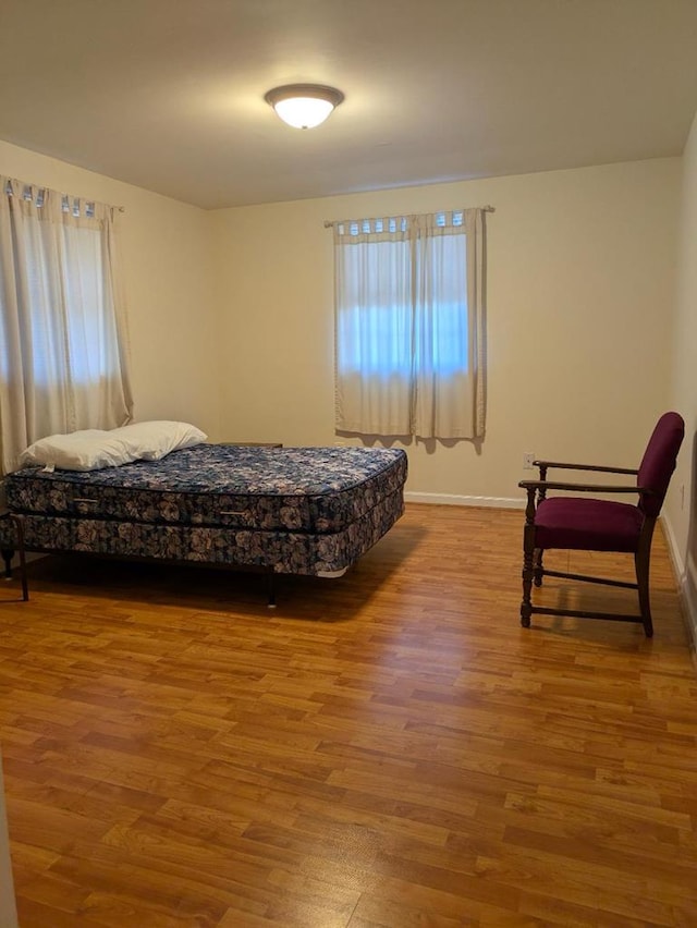 bedroom featuring hardwood / wood-style floors