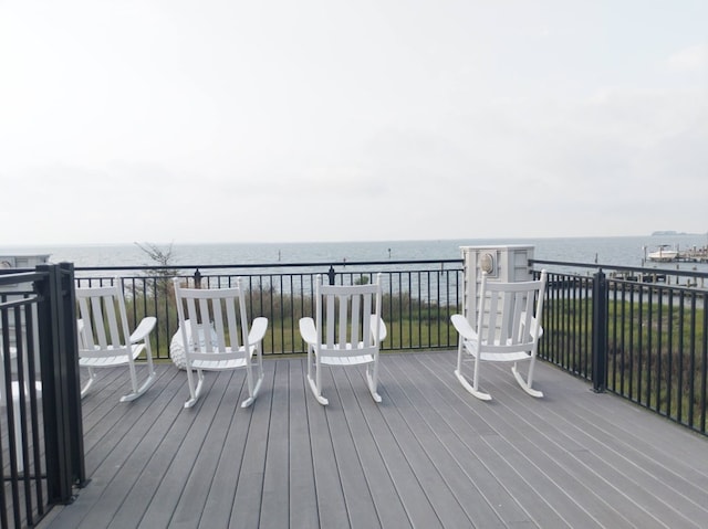 deck featuring a water view