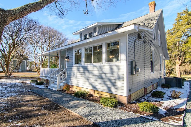 view of front of home featuring central air condition unit