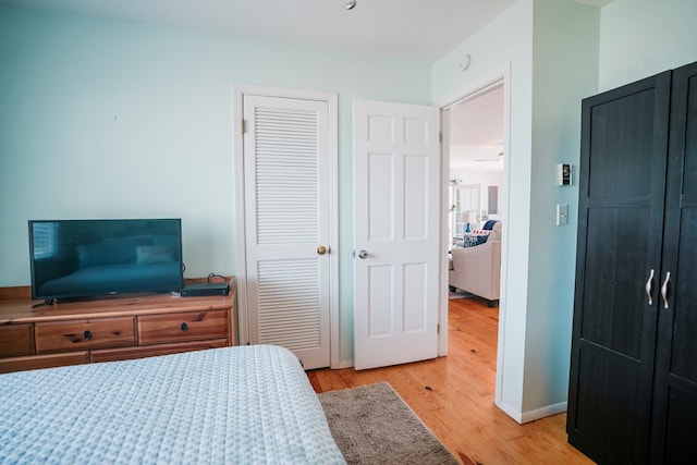 6345 Clark St, Chincoteague, VA 23336 - bedroom with a closet and light wood-style flooring