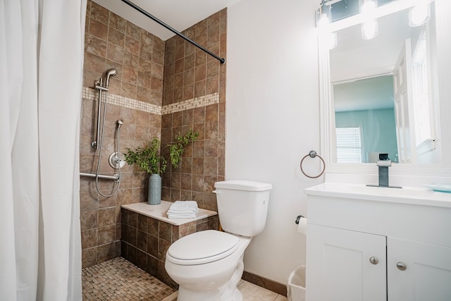 6345 Clark St, Chincoteague, VA 23336 - bathroom featuring vanity, tiled shower, and tile patterned flooring