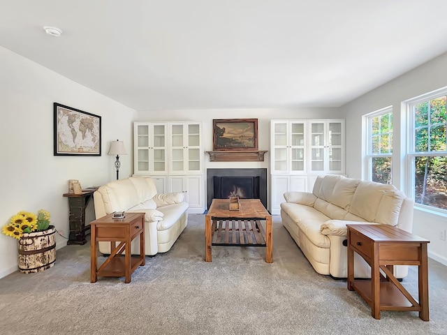 living room featuring light carpet