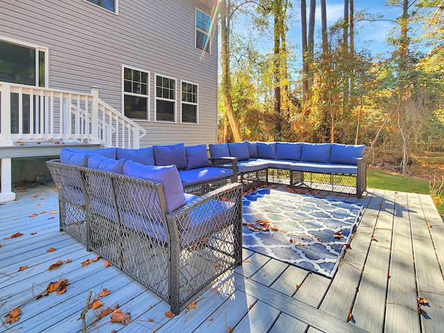 wooden terrace with outdoor lounge area