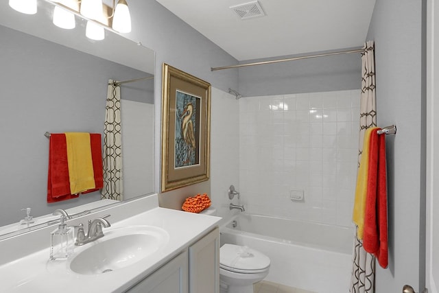 full bathroom featuring vanity, toilet, and shower / tub combo with curtain