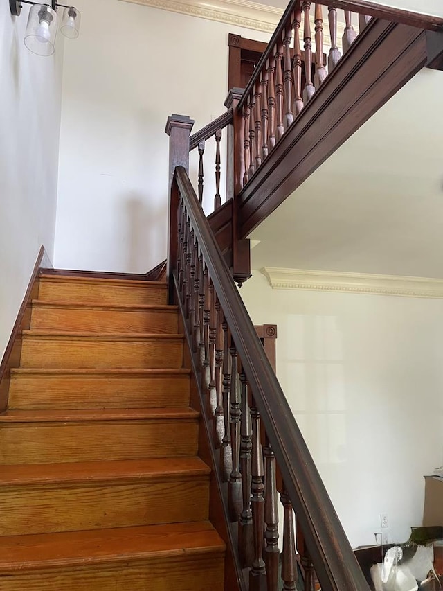 12 Justis St, Onancock, VA 23417 - stairs featuring crown molding