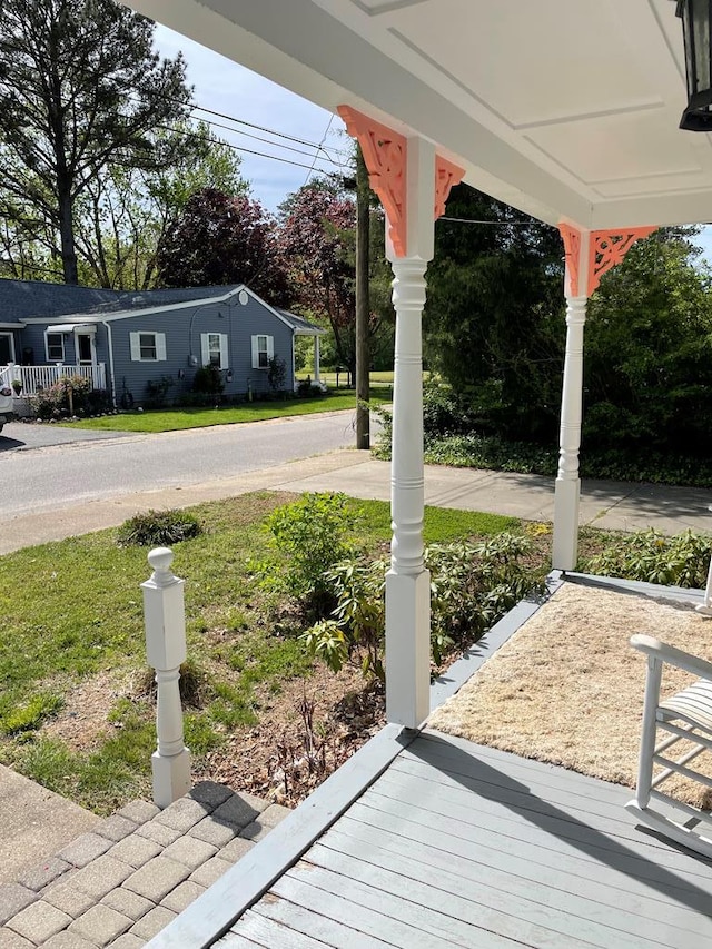 12 Justis St, Onancock, VA 23417 - view of green lawn featuring covered porch