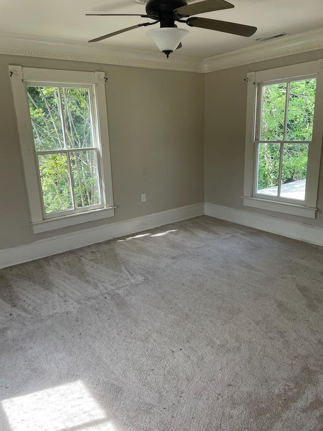 12 Justis St, Onancock, VA 23417 - carpeted empty room featuring ceiling fan, crown molding, healthy amount of natural light, and baseboards