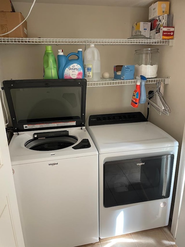12 Justis St, Onancock, VA 23417 - washroom featuring washing machine and clothes dryer and tile patterned flooring