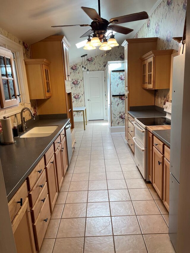 12 Justis St, Onancock, VA 23417 - kitchen featuring wallpapered walls, white appliances, a sink, ceiling fan, and dark countertops