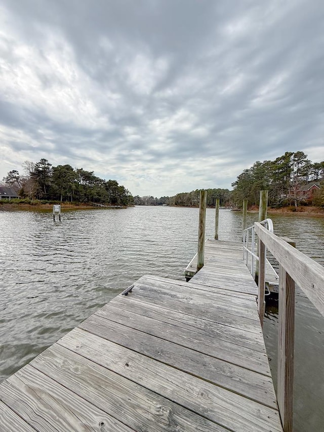 dock area featuring a water view