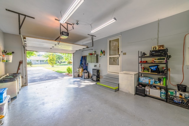 garage featuring a garage door opener