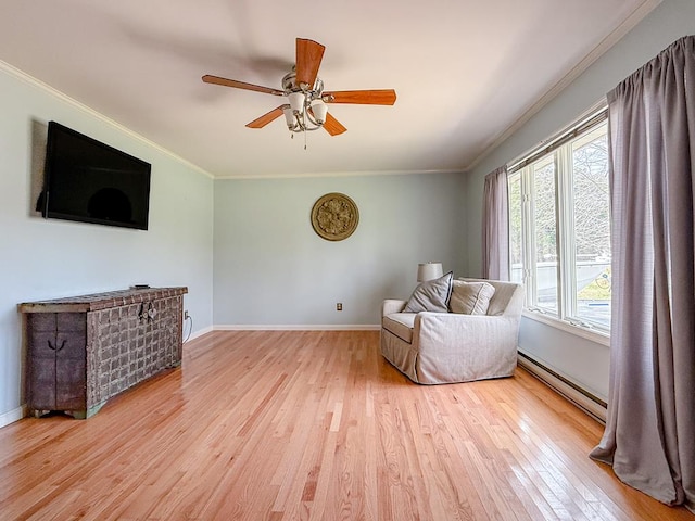 unfurnished room featuring baseboards, baseboard heating, crown molding, and light wood-style floors