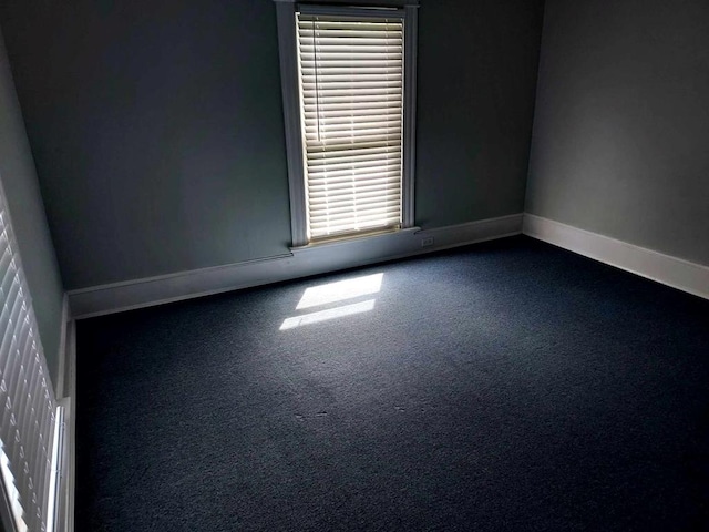 empty room featuring carpet