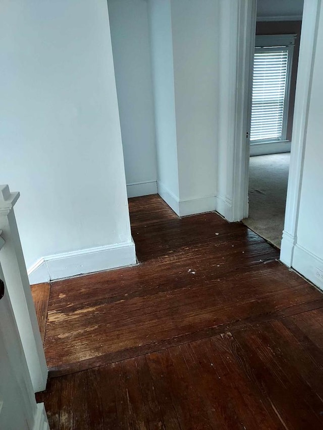 unfurnished room featuring dark hardwood / wood-style floors