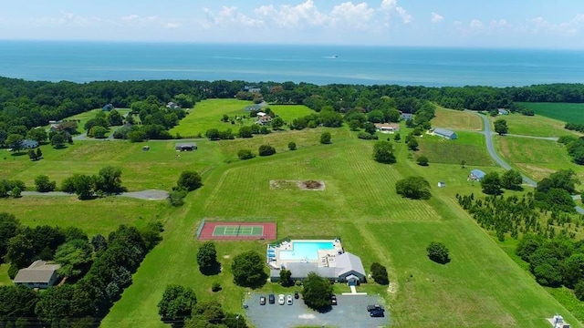 birds eye view of property with a water view and a rural view