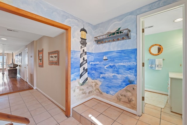 hallway with light tile patterned floors