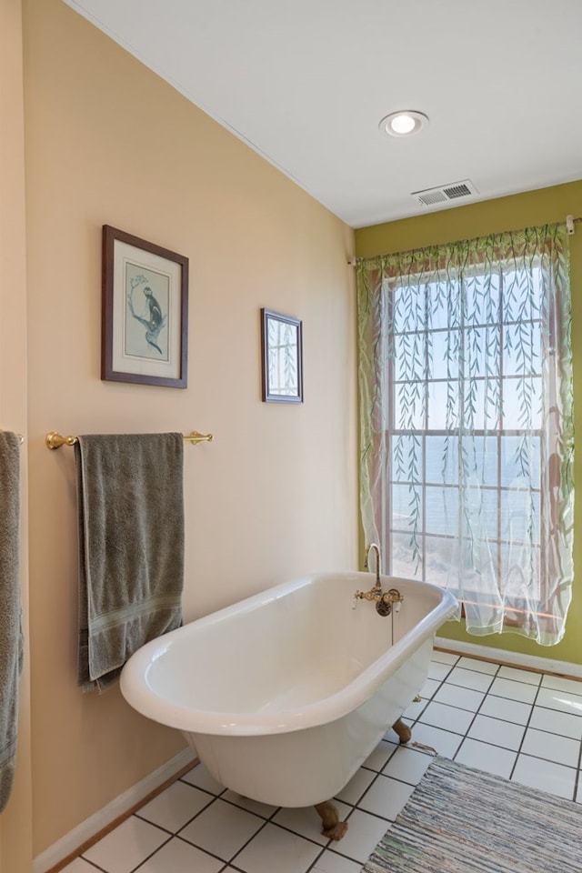 bathroom featuring a bathing tub and tile patterned floors