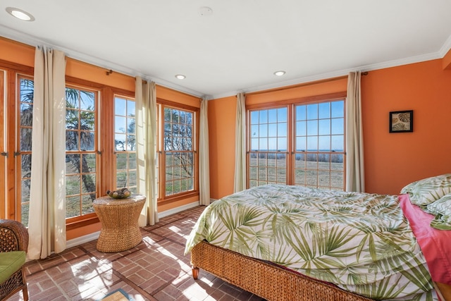 bedroom with ornamental molding