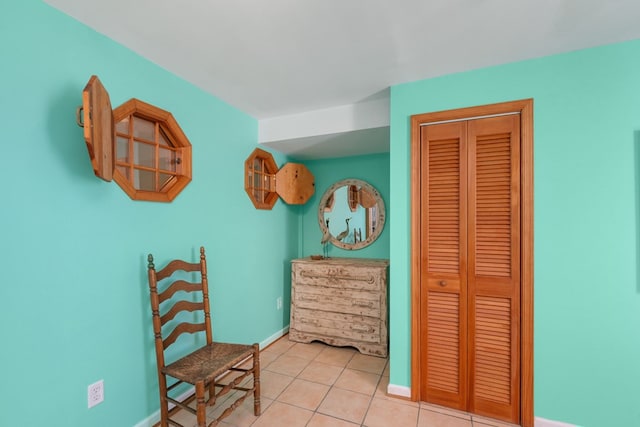 living area with light tile patterned floors