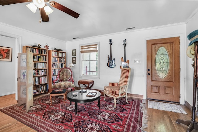 28099 Harborton Rd, Harborton, VA 23389 - entrance foyer featuring wood finished floors, ceiling fan, ornamental molding, and baseboards