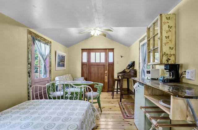 28099 Harborton Rd, Harborton, VA 23389 - bedroom with light wood finished floors, multiple windows, and vaulted ceiling