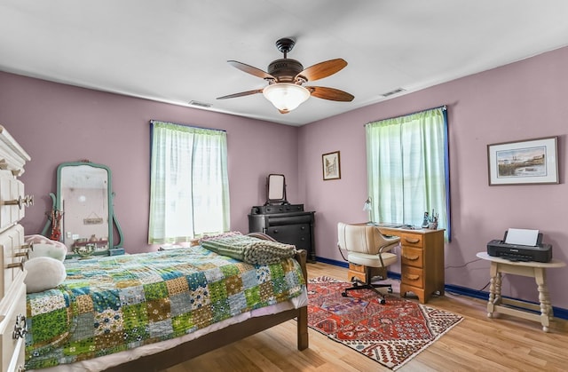 28099 Harborton Rd, Harborton, VA 23389 - bedroom with wood finished floors, baseboards, ceiling fan, and an office area
