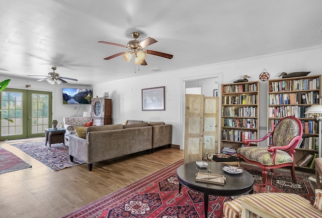 28099 Harborton Rd, Harborton, VA 23389 - living area featuring ceiling fan, wood finished floors, french doors, and crown molding