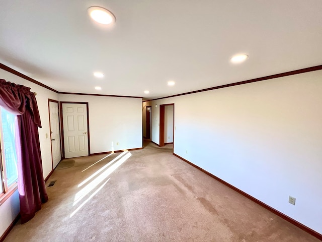 18095 Mappsburg Rd, Painter, VA 23420 - unfurnished bedroom featuring crown molding, recessed lighting, and light carpet