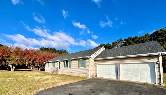 18095 Mappsburg Rd, Painter, VA 23420 - view of front facade with a garage, driveway, a front yard, a shingled roof, and crawl space