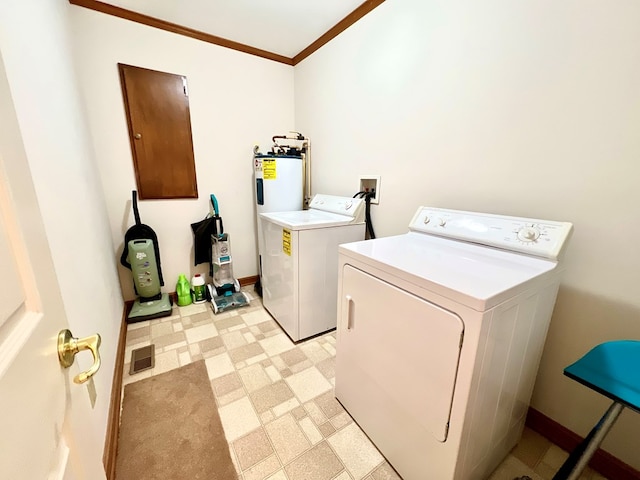 18095 Mappsburg Rd, Painter, VA 23420 - washroom featuring washing machine and dryer, ornamental molding, light floors, and electric water heater
