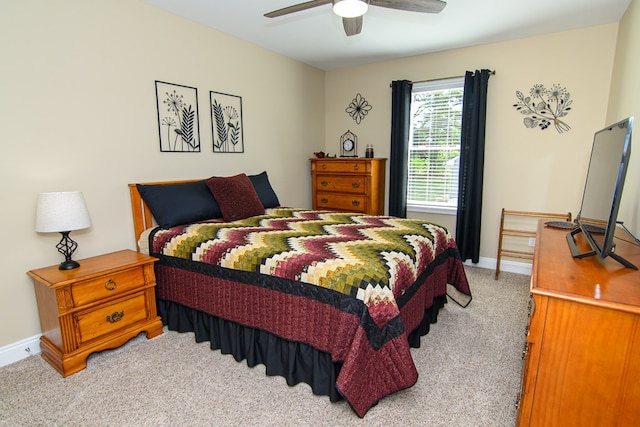 2265 Yardarm Dr, Greenbackville, VA 23356 - carpeted bedroom with baseboards and a ceiling fan
